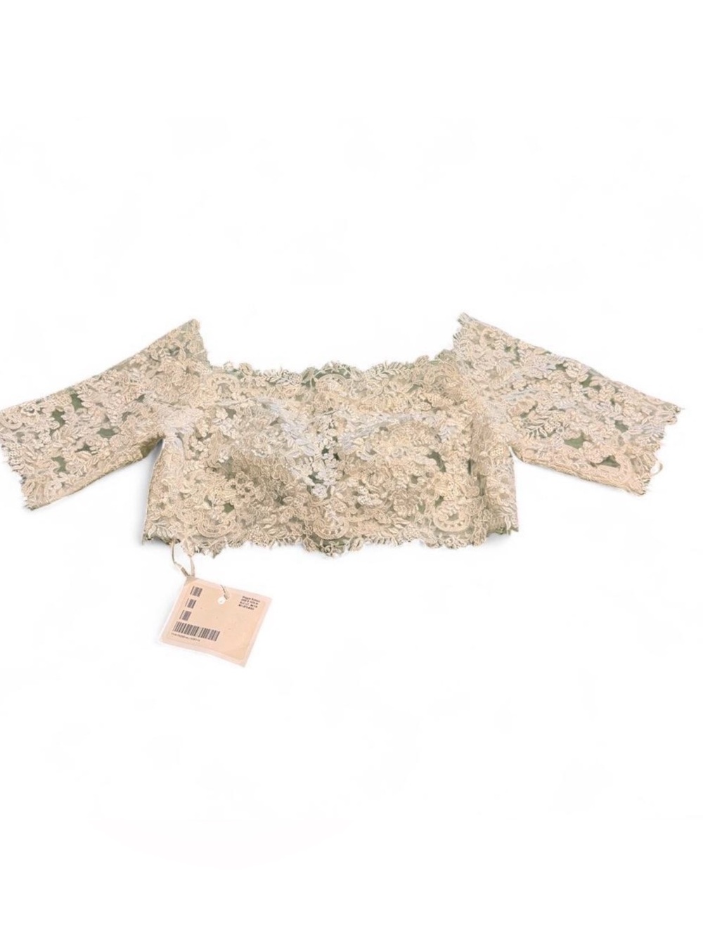 White lace crop top with floral embroidery and sequins